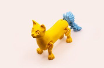 Рухома іграшка "Хвостатий кіт". 22 см CAT-0002-22-YELLOW-BLUE виготовлений на 3D принтері